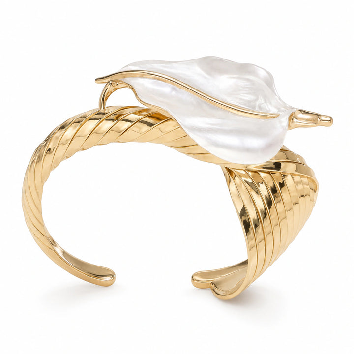 Warm gold-tone pearly sculptural leaf ribbed kada bracelet