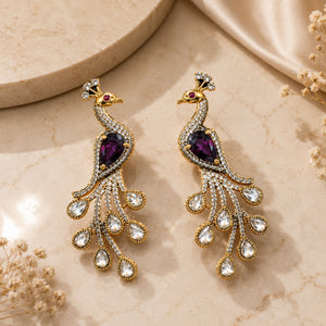 Product details card for gold-tone purple peacock chandelier earrings