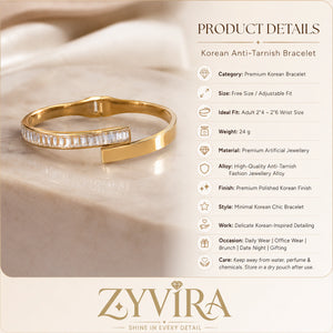 Gold rectangular crystal cuff styled in an elegant jewellery flat lay