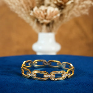 Alternate product view of the gold ribbed oval-link bracelet
