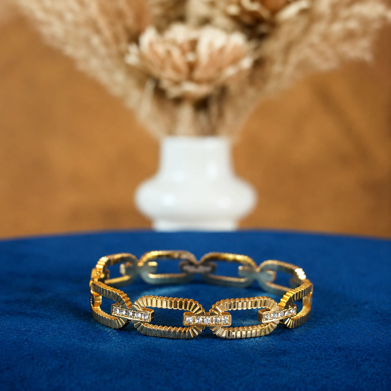 Alternate product view of the gold ribbed oval-link bracelet