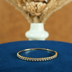 Alternate product view of the gold round crystal tennis bangle