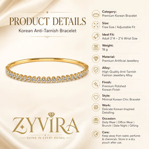 Gold round crystal tennis bangle styled in an elegant jewellery flat lay
