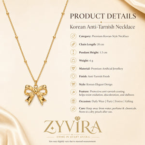 Product details card for the gold sculpted bow charm necklace