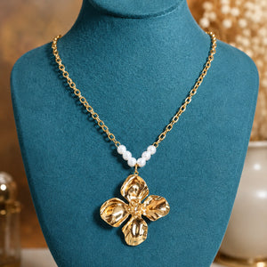 Alternate detail view of the sculpted floral pearl pendant