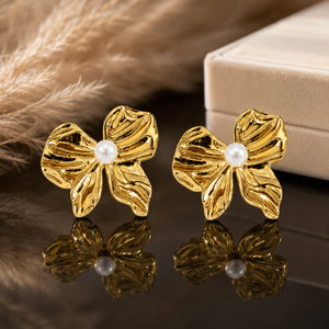 Gold-tone sculpted pearl-style flower stud earrings