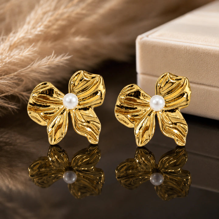 Gold-tone sculpted pearl-style flower stud earrings