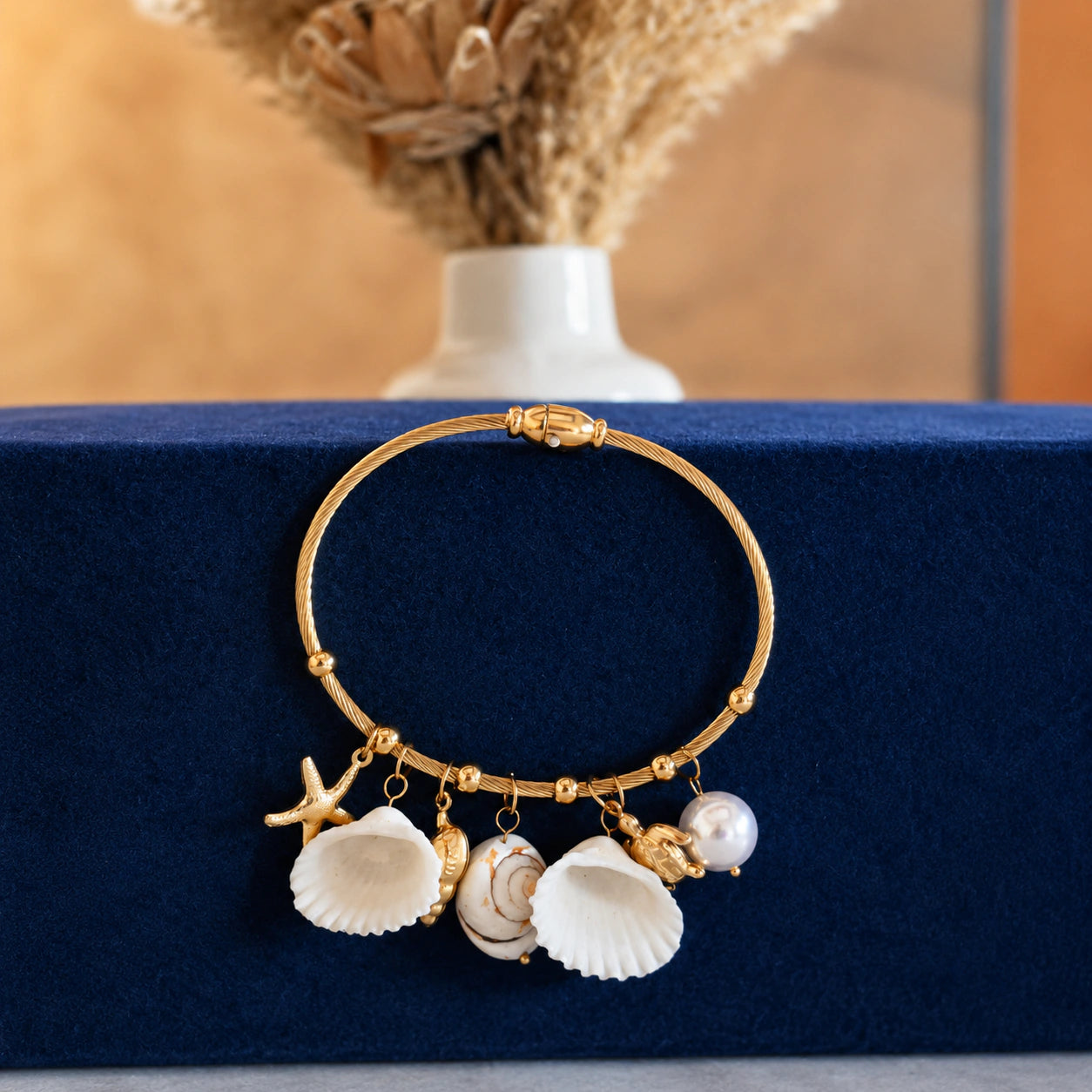 Alternate detail view of the shell starfish pearl bracelet