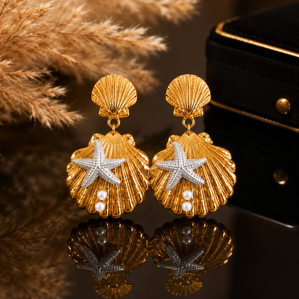 Product details card for gold shell starfish pearl earrings