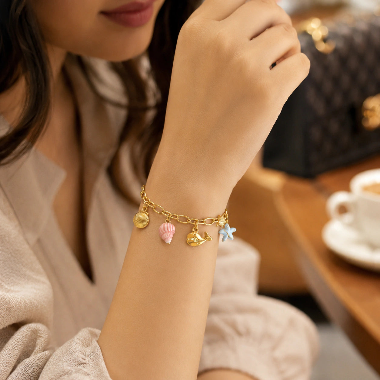 Alternate product view of the gold shell turtle starfish bracelet