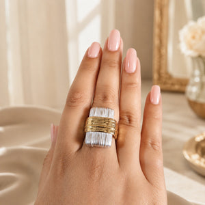 Close-up of gold and silver ribbed geometric detailing