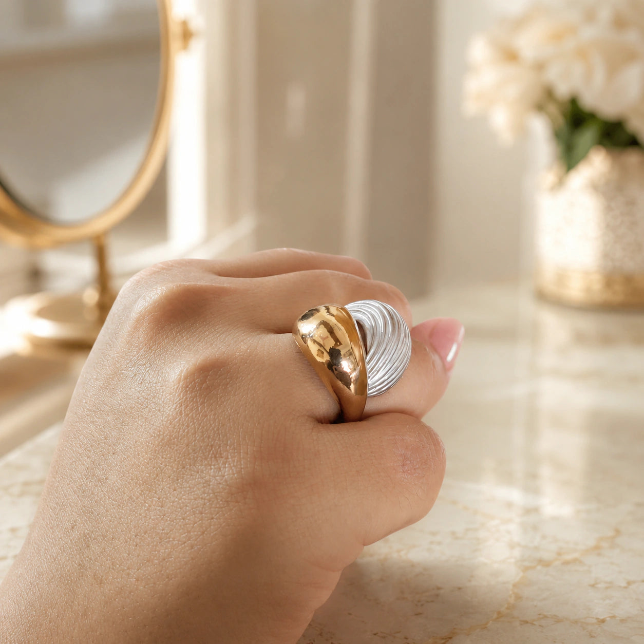 Alternate product view of the gold and silver ribbed wrap ring