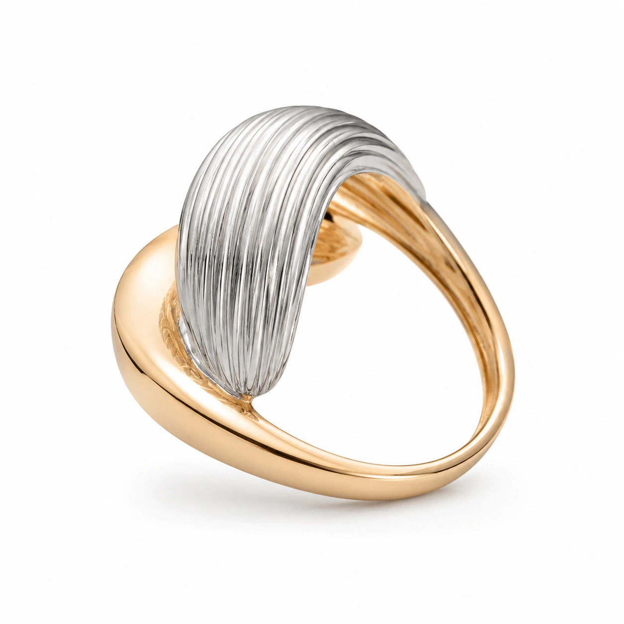 Gold and silver ribbed sculptural wrap ring