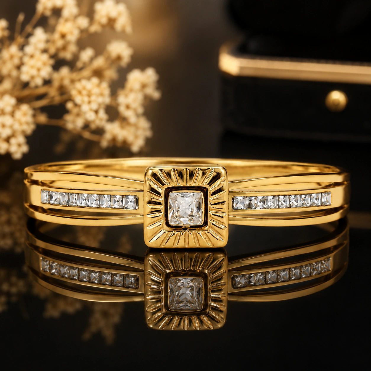 Gold-tone square sunburst crystal rigid bracelet