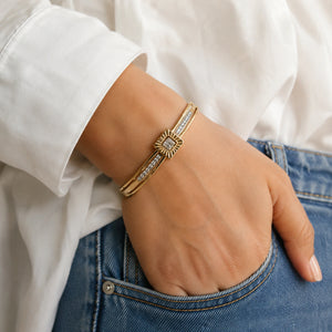 Side view of the gold square sunburst crystal bracelet