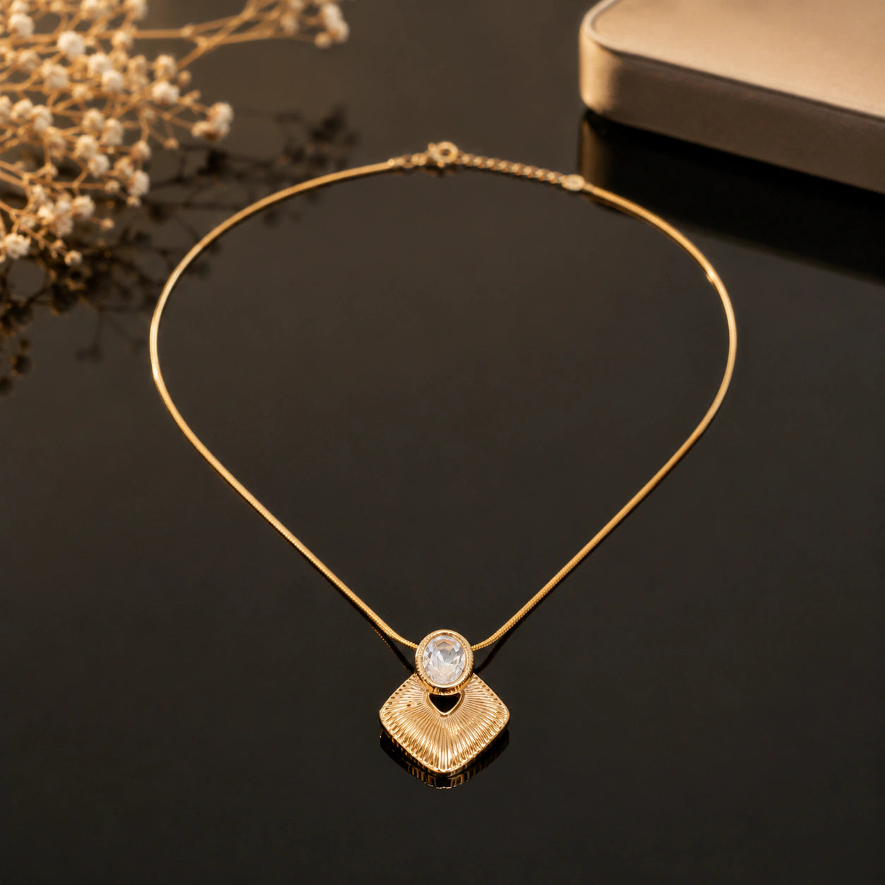 Alternate detail view of the sunburst oval crystal pendant