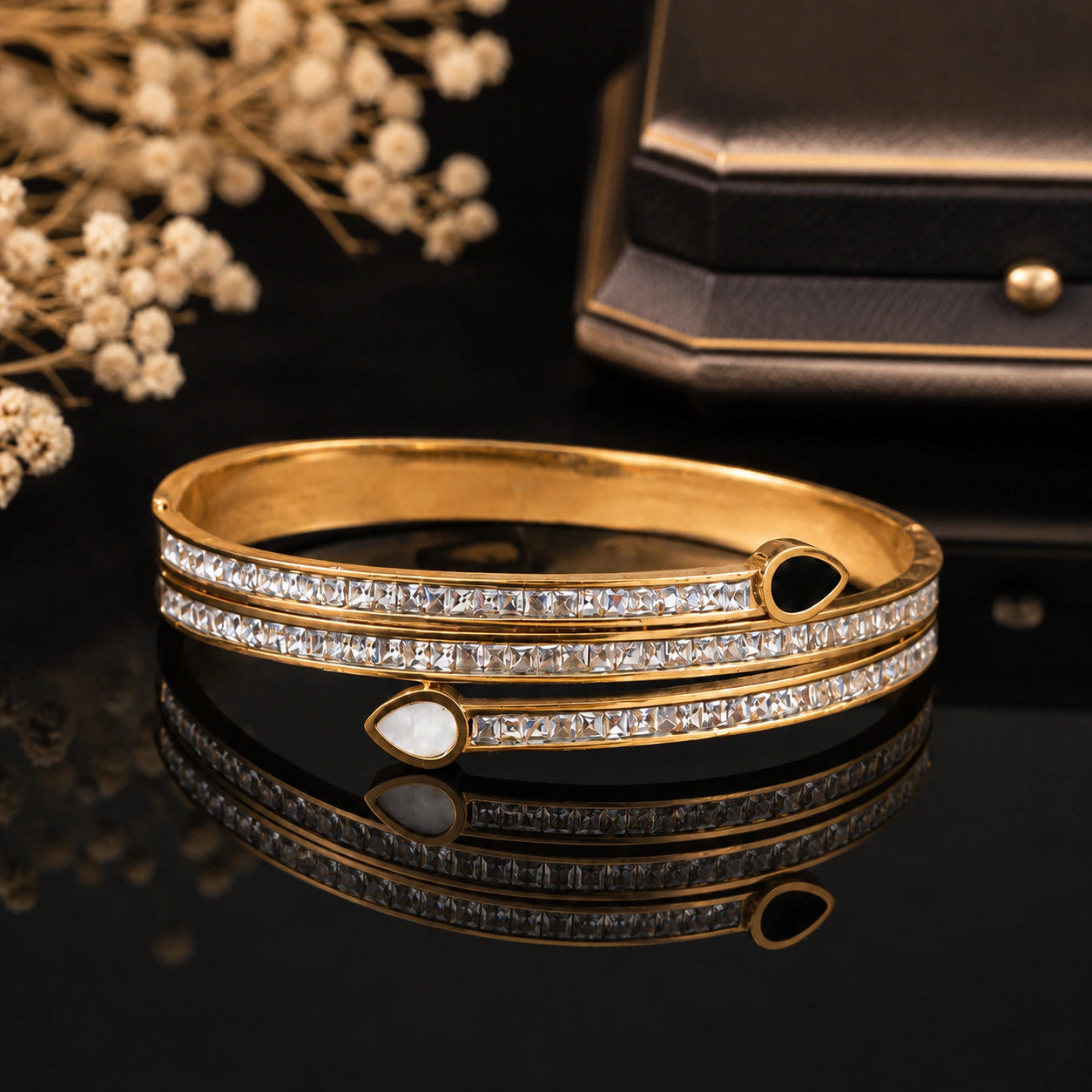 Alternate product view of the gold teardrop crystal kada