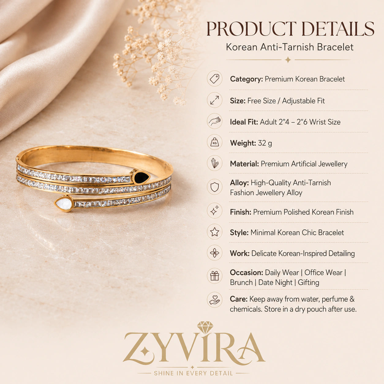 Gold teardrop crystal kada styled in an elegant jewellery flat lay