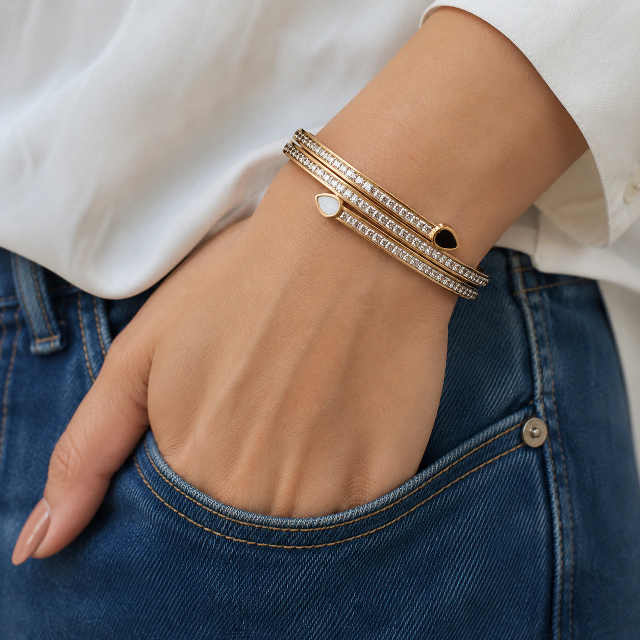 Side view of the gold teardrop crystal layered kada