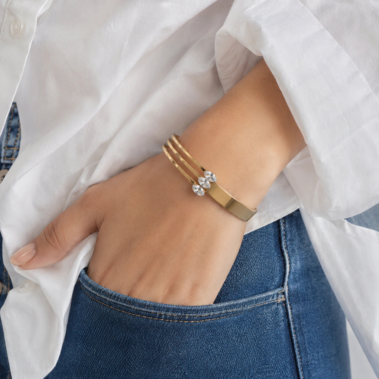 Alternate product view of the gold triple-bar crystal kada