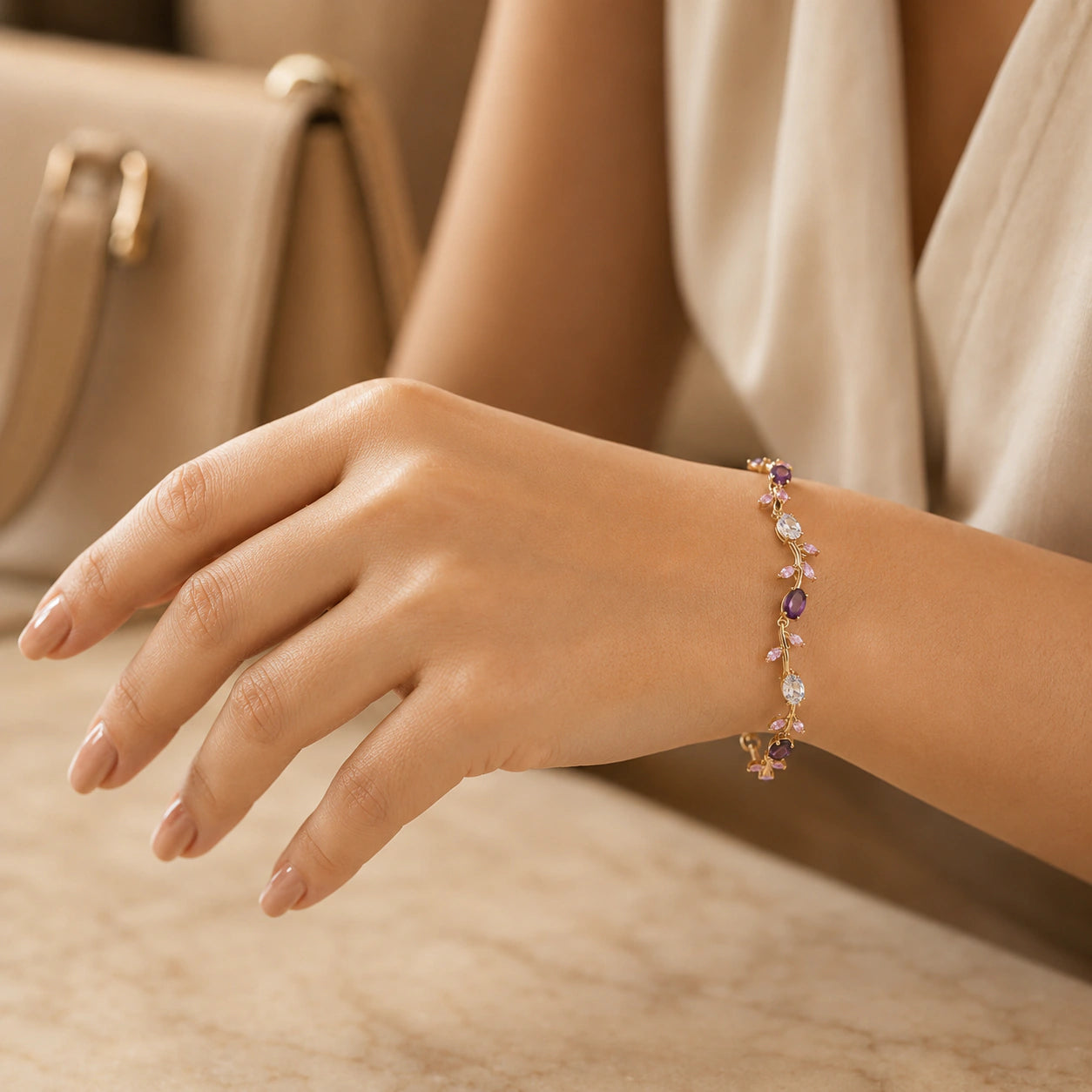 Gold multicolour tulip bracelet styled in an elegant jewellery flat lay