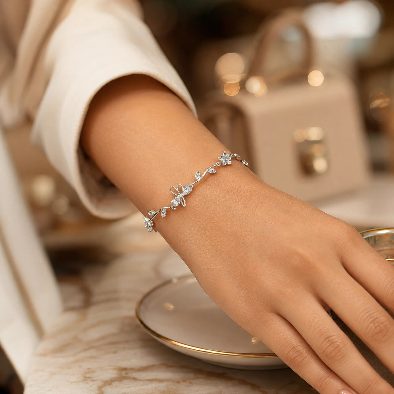 Angled view of the gold tulip-vine crystal bracelet