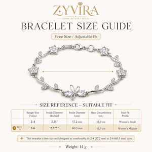 Gold tulip-vine bracelet styled in an elegant jewellery flat lay