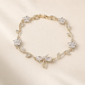 Open link view of the gold tulip-vine bracelet