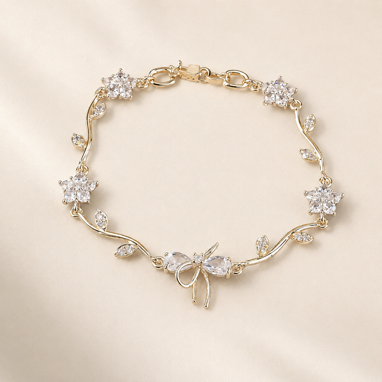 Open link view of the gold tulip-vine bracelet