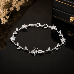 Side view of the gold tulip-vine crystal bracelet