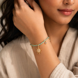 Alternate product view of the gold turquoise braided bracelet