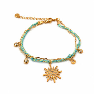 Gold-tone turquoise braided sunburst charm bracelet
