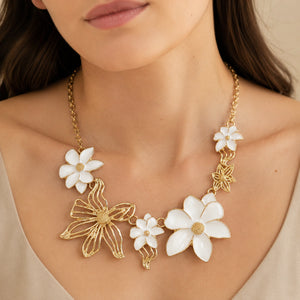 Angled view of the gold white floral openwork Hasali