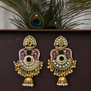 Close-up ear view showing the layered pearl drops and jhumka profile