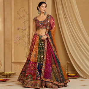 Kundan-style Meenakari pearl jhumka earrings styled in an elegant jewellery flat lay