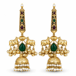 Angled view of gold-tone Kundan pearl jhumka earrings with layered drops