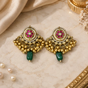 Close-up ear view showing the pearl-style drops and jhumka profile
