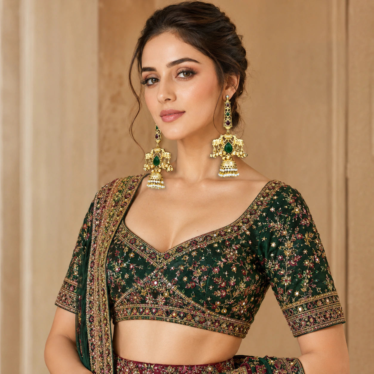 Close-up of Kundan-style stones, pearl-style drops and gold-tone jhumka detailing