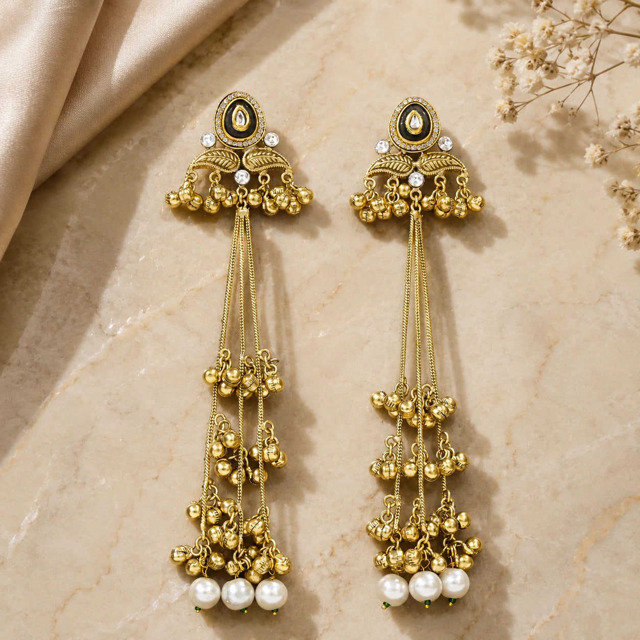 Alternate product view of gold-tone Kundan-style earrings with pearl tassels