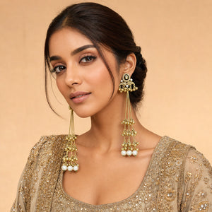 Close-up of Kundan-style stones, pearl-style borders and layered tassel detailing