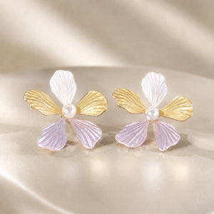 Close-up of lavender multicolour flowers and pearl-style drops