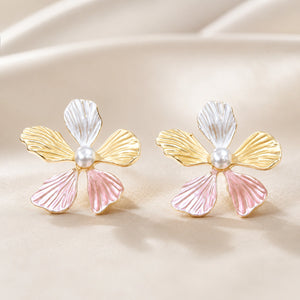 Close-up of pink multicolour flowers and pearl-style detailing