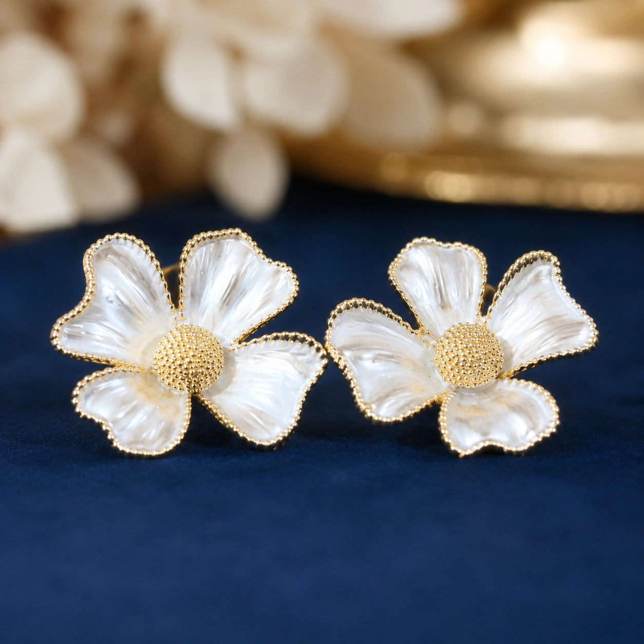 Pearl gold sculpted floral drop earrings