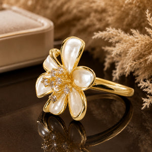 Side view of the pearl-white crystal floral ring