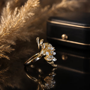 Open adjustable view of the pearl-white starburst ring