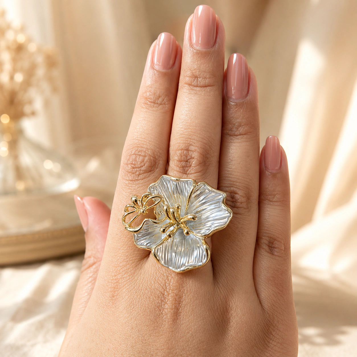 Pearl-white ribbed floral butterfly statement ring