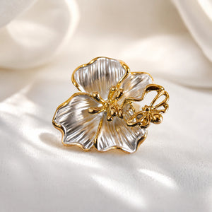 Side view of the pearl-white floral butterfly ring