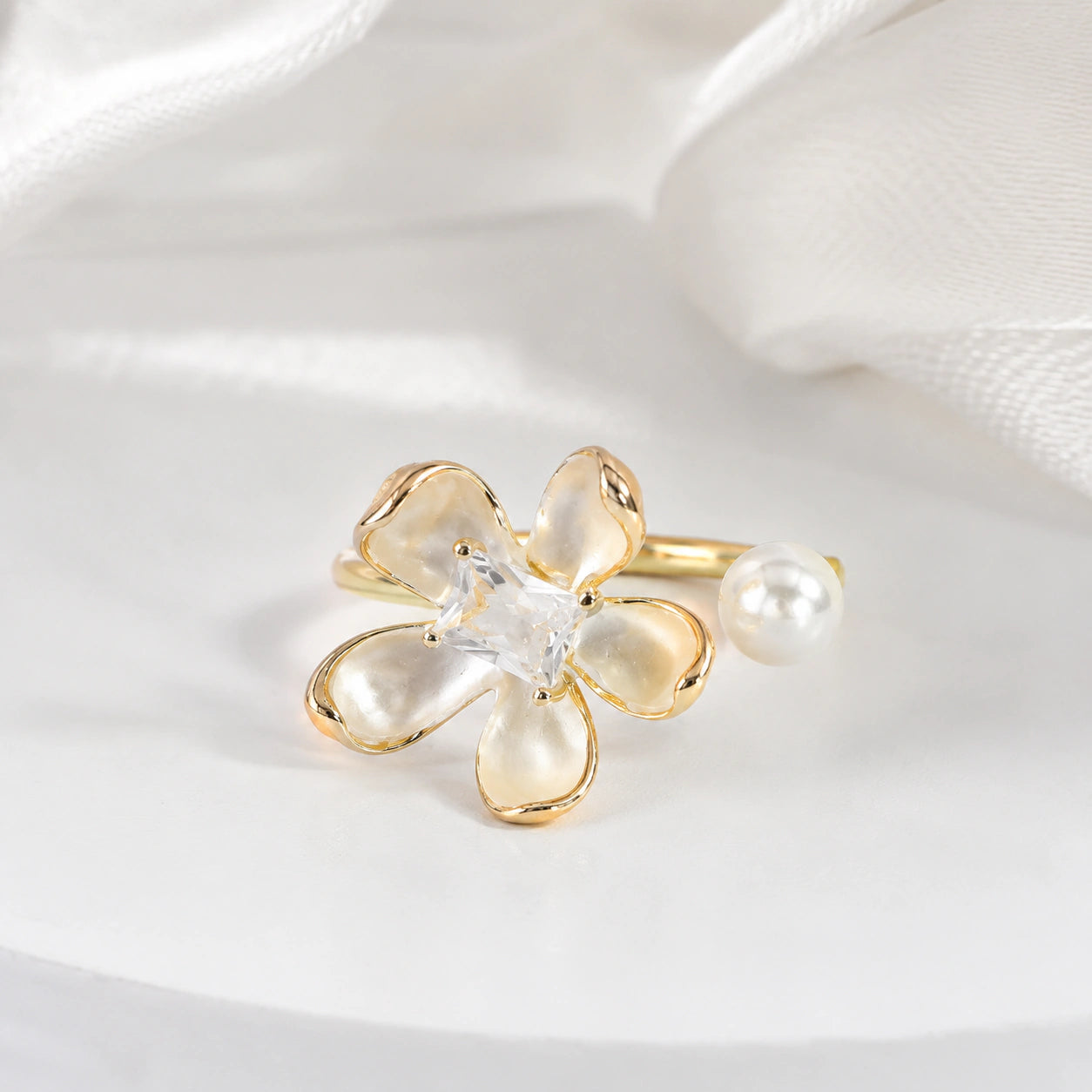 Alternate product view of the pearl-white floral crystal ring