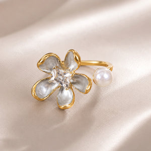 Side view of the pearl-white floral crystal open ring