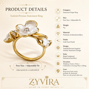 Pearl-white floral ring styled in an elegant jewellery flat lay